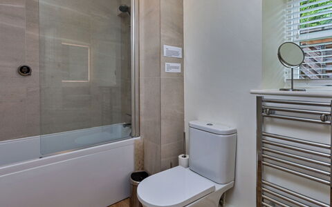 The Burrows: Bathroom, Toilet Seat, Plumbing Fixture, Toilet, Flooring, Floor, Bathtub, Interior Design, Plumbing, Tap