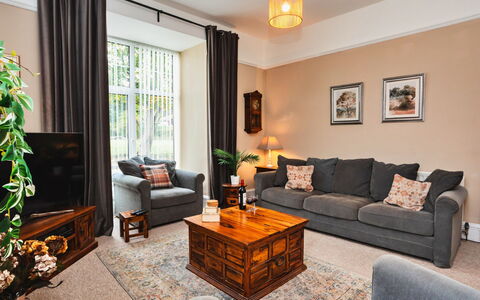 The Old Storehouse: Furniture, Interior Design, Couch, Flooring, Floor, Wood, Room, Living Room, Ceiling, Lighting