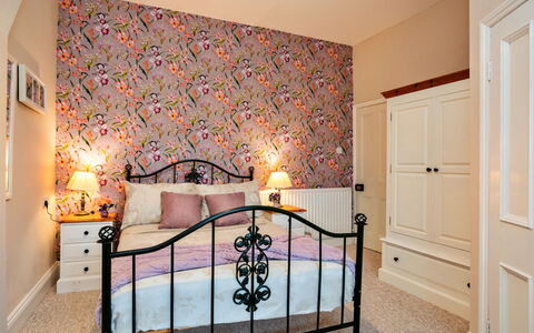 The Old Storehouse: Furniture, Interior Design, Wall, Bedroom, Textile, Bed, Pink, Lighting, Room, Flooring