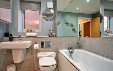 South Beach House: Bathroom, Interior Design, Plumbing Fixture, Flooring, Sink, Mirror, Floor, Bathtub, Tap, Bathroom Sink