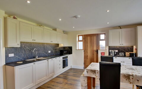 The Owls Rest: Furniture, Interior Design, Wood, Ceiling, Flooring, Cabinetry, Kitchen, Countertop, Room, Lighting