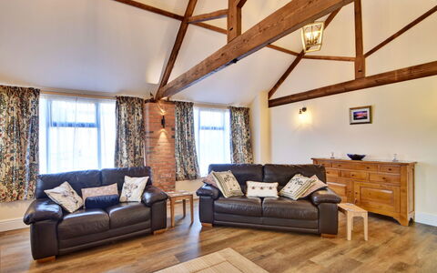 The Owls Rest: Wood, Furniture, Home, Ceiling, Hardwood, Living Room, Daylighting, Couch, Wood Flooring