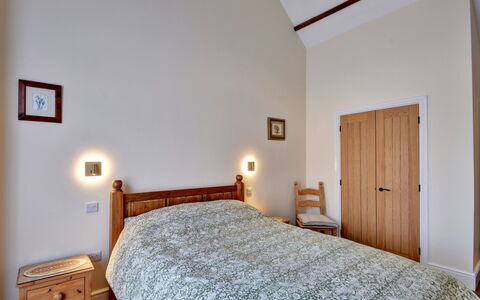 The Owls Rest: Bed, Furniture, Bedroom, Wall, Interior Design, Wood, Ceiling, Floor, Bedding, Flooring