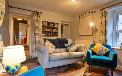 East Bank: Furniture, Interior Design, Wall, Couch, Wood, Flooring, Living Room, Room, Floor, Home