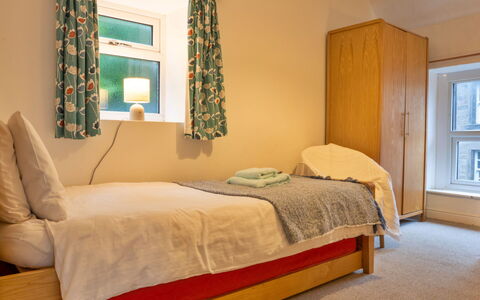 East Bank: Furniture, Bed, Interior Design, Bedroom, Flooring, Wall, Floor, Bed Sheet, Bedding, Wood