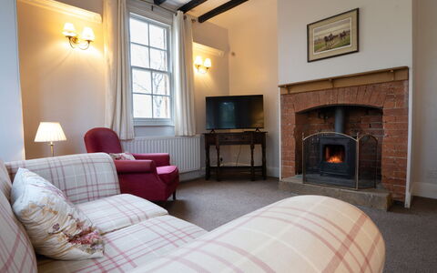 South Lodge at Longford: Wall, Furniture, Wood, Interior Design, Ceiling, Flooring, Floor, Home, Room, Living Room