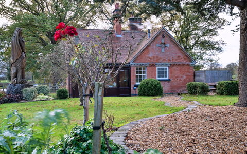 South Lodge at Longford: Grass, House, Roof, Shrub, Cottage, Garden, Home, Residential Area, Land Lot