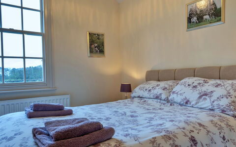 South Lodge at Longford: Bed, Bedroom, Bed Sheet, Bedding, Wood, Furniture, Linens, Bed Frame, Floor, Interior Design