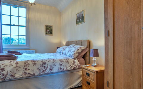 South Lodge at Longford: Bed, Bedding, Bedroom, Furniture, Bed Sheet, Wall, Wood, Interior Design, Floor, Flooring