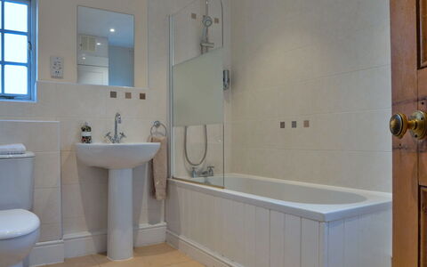 South Lodge at Longford: Bathroom, Flooring, Plumbing Fixture, Floor, Bathtub, Wall, Interior Design, Tap, Plumbing, Room