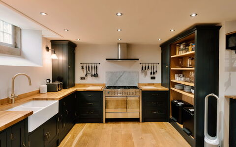 Heather View Chapel: Kitchen, Furniture, Kitchen Appliance, Countertop, Cabinetry, Interior Design, Flooring, Major Appliance, Wood, Kitchen Stove