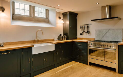 Heather View Chapel: Kitchen, Countertop, Cabinetry, Kitchen Appliance, Flooring, Wood, Interior Design, Major Appliance, Furniture, Kitchen Stove