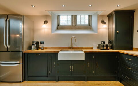 Heather View Chapel: Kitchen, Countertop, Kitchen Appliance, Furniture, Cabinetry, Interior Design, Flooring, Major Appliance, Wood, Floor