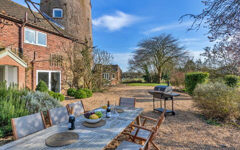 The Old Windmill: Wall, Shrub, Land Lot, Cottage, Estate, Brick, Garden, Landscaping, Farmhouse, Brickwork