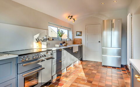 The Old Windmill: Kitchen, Kitchen Appliance, Countertop, Major Appliance, Flooring, Cabinetry, Home Appliance, Interior Design, Kitchen Stove, Furniture