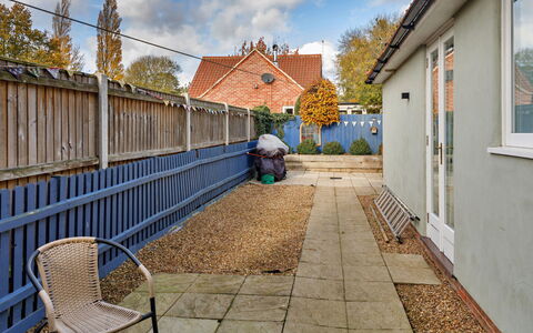 The Chapel: Wall, Residential Area, Home, Composite Material, Fence, Home Fencing, Backyard, Brick, Walkway, Garden