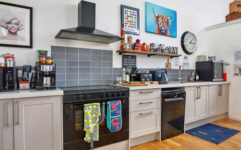 The Chapel: Kitchen Appliance, Kitchen, Major Appliance, Countertop, Interior Design, Furniture, Kitchen Stove, Flooring, Home Appliance, Cabinetry