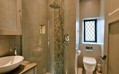 Greenacres: Bathroom, Interior Design, Plumbing Fixture, Flooring, Wall, Floor, Toilet, Tile, Mirror, Home