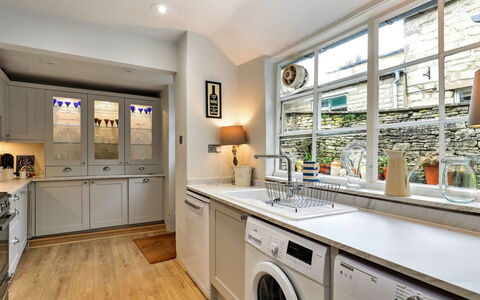 Aarons: Interior Design, Flooring, Wood, Furniture, Cabinetry, Countertop, Kitchen, Floor, Major Appliance, Home