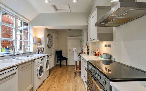 Aarons: Interior Design, Flooring, Major Appliance, Kitchen, Countertop, Kitchen Appliance, Cabinetry, Furniture, Wood, Floor