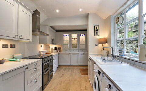 Aarons: Interior Design, Flooring, Countertop, Cabinetry, Furniture, Kitchen, Wood, Floor, Ceiling, Major Appliance