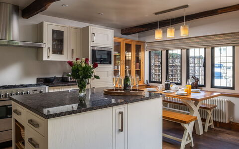 The Painswick Retreat: Furniture, Kitchen, Countertop, Interior Design, Cabinetry, Flooring, Kitchen Appliance, Wood, Ceiling, Light Fixture