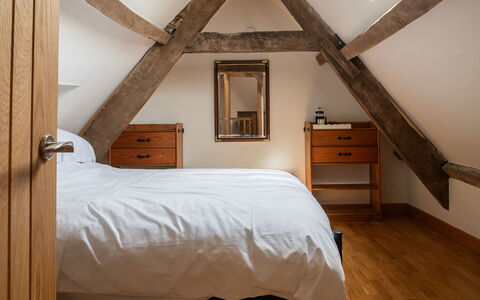 Tranquility House: Bed, Furniture, Bedroom, Interior Design, Wall, Flooring, Wood, Floor, Bedding, Bed Sheet