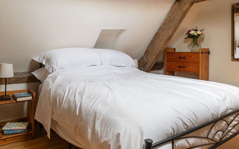 Tranquility House: Bed, Furniture, Bedding, Bedroom, Bed Sheet, Interior Design, Floor, Flooring, Wood, Linens