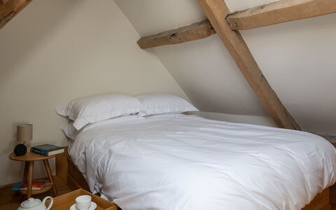 Tranquility House: Bed, Bedroom, Bedding, Bed Sheet, Furniture, Wood, Interior Design, Linens, Floor, Flooring