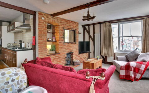The Red House, Maldon: Furniture, Home, Apartment, Brick, Couch, Living Room, Chimney, Lamp