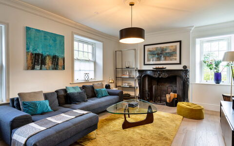 The Mount: Furniture, Interior Design, Floor, Flooring, Couch, Wall, Living Room, Room, Wood, Ceiling