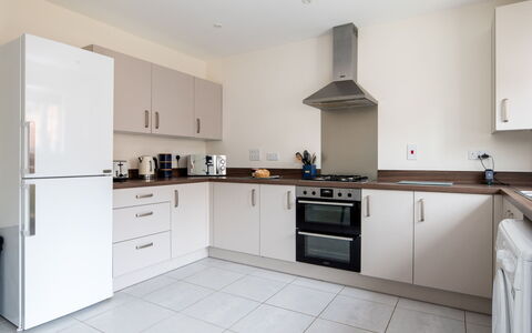Field View: Flooring, Interior Design, Wood, Cabinetry, Ceiling, Kitchen, Major Appliance, Floor, Countertop, Furniture