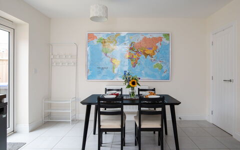 Field View: Furniture, Interior Design, Table, Dining Room, Flooring, Kitchen & Dining Room Table, Chair, Room, Floor, Picture Frame