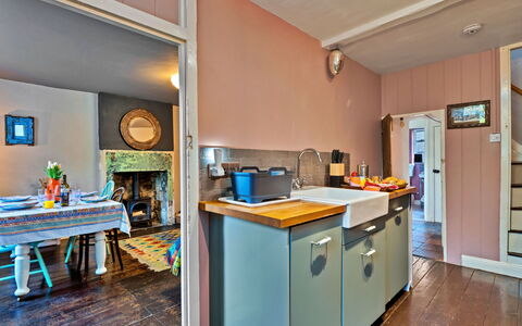 Flittermouse Cottage: Furniture, Kitchen, Wood, Countertop, Interior Design, Flooring, Ceiling, Floor, Room, Lighting
