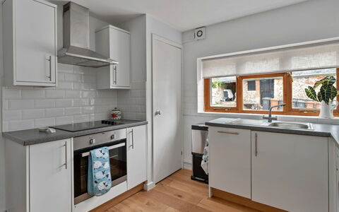 Poundtree: Kitchen, Kitchen Appliance, Countertop, Cabinetry, Major Appliance, Interior Design, Flooring, Kitchen Sink, Home Appliance, Wood