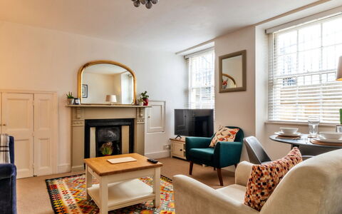 Bath 602: Furniture, Interior Design, Flooring, Wall, Floor, Wood, Room, Ceiling, Living Room, Couch