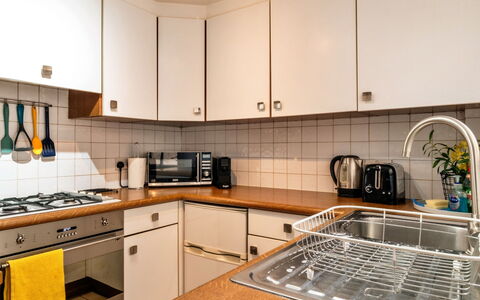 Bath 602: Kitchen, Kitchen Appliance, Countertop, Major Appliance, Cabinetry, Interior Design, Flooring, Wood, Home Appliance, Kitchen Stove