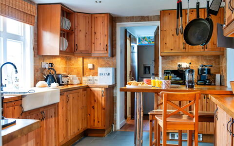 Cricketers' Cottage: Kitchen, Furniture, Countertop, Kitchen Appliance, Cabinetry, Major Appliance, Wood, Interior Design, Flooring, Cupboard