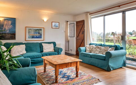 Cricketers' Cottage: Furniture, Interior Design, Wood, Couch, Flooring, Floor, Table, Room, Ceiling, Living Room
