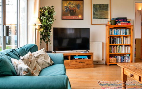 Cricketers' Cottage: Furniture, Interior Design, Couch, Flooring, Living Room, Room, Floor, Wood, Lighting, Textile
