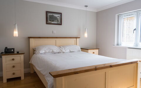 Hollies Coach House: Bed, Furniture, Bedding, Bedroom, Interior Design, Bed Sheet, Wall, Wood, Flooring, Floor