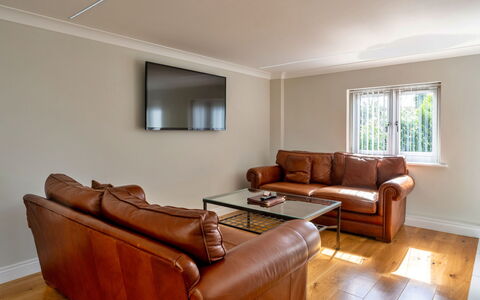 Hollies Coach House: Interior Design, Flooring, Floor, Wood, Ceiling, Couch, Furniture, Room, Lighting, Living Room