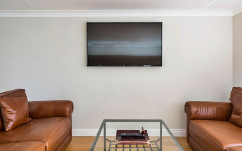 Hollies Coach House: Flooring, Wood, Interior Design, Floor, Couch, Furniture, Ceiling, Living Room, Home, Lighting
