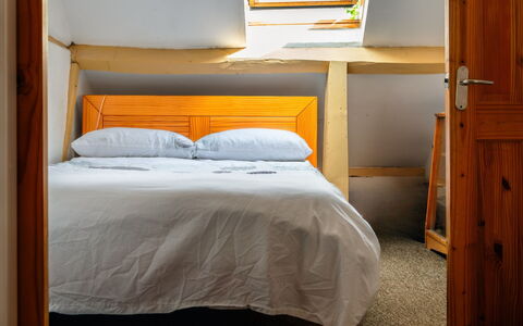 Three Storeys in Newent: Bed, Bedroom, Furniture, Bed Sheet, Wall, Bedding, Interior Design, Floor, Wood, Yellow