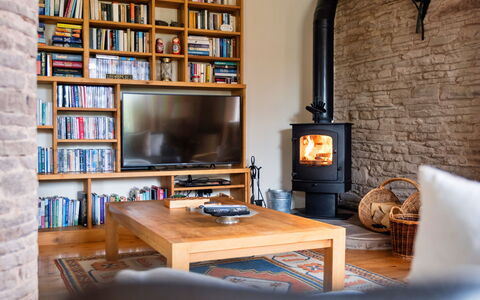 New Lodge Granary: Furniture, Interior Design, Flooring, Wood, Hearth, Floor, Shelving, Shelf, Living Room, Lighting