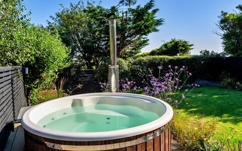 Firethorn: Bathtub, Plumbing Fixture, Composite Material, Jacuzzi, Garden, Wood Stain, Design, Yard, Hardwood