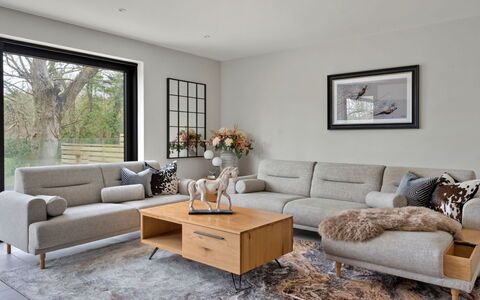 Orchard Rise: Furniture, Couch, Flooring, Interior Design, Living Room, Floor, Table, Throw Pillow, Wood Flooring