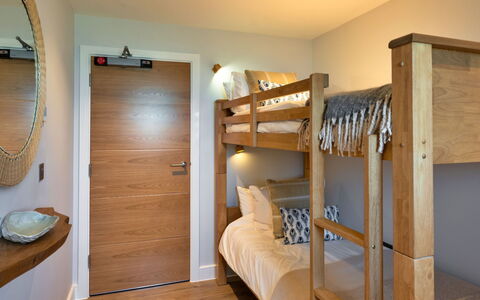 Perrantide: Furniture, Bed, Bunk Bed, Bedroom, Interior Design, Wood, Flooring, Bedding, Floor, Room