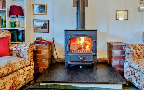 Millook Water: Hearth, Furniture, Wood-Burning Stove, Fireplace, Chimney, Living Room, Brick, Heat, Masonry Oven