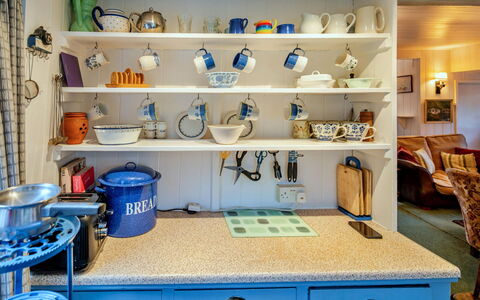 Millook Water: Blue, Furniture, Shelf, Shelving, Interior Design, Wood, Kitchen, Lighting, Tableware, Cabinetry